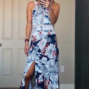 Floral maxi dress with open back and slit.
